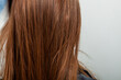 © romeof - Photo of a European girl with long and beautiful brunette hair at the beauty salon. Shiny and healthy hair
