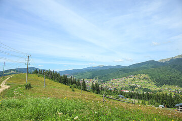 Wall Mural - Beautiful mountain landscape with village in Carpathians, Ukraine