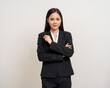 © Chanakon - Attractive Young asian business woman smiling to camera standing pose on isolated white background. Latin Female around 25 in black suit portrait shot in studio.
