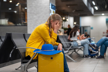 Woman missed her flight or it was cancelled.