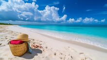 A Panoramic View Of A Beach Bag, Towel, And Flip-flops Set Against A Backdrop Of White Sand And Turquoise Water At Anguilla Island. This Scene Embodies The Concept Of Vacation