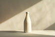 white plastic bottle on a table