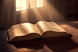 Fototapeta Uliczki - Open bible with sunlight
