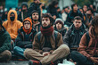 © mila103 - Migrants sitting in front of a city hall, protesting against corruption
