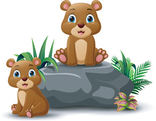 Wall Mural - Cute baby bear cartoon sitting on the stone