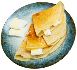 Wall Mural - Pancakes with brie cheese dished up in flat service plate. Isolated over white background