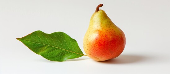 Sticker - A pear, a staple food and superfood, is a fruit with a green leaf, representing natural and healthy produce.