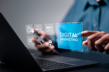 Wall Mural - digital marketing concept. businessman use laptop with virtual screen of digital marketing for busin