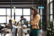 © Wavebreak Media - Young Caucasian woman contemplates a casual business project in the office