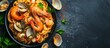 Seafood pasta with clams and prawns, top view, with room for text.