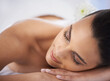 © Mapodile M./peopleimages.com - Relax, nap and woman at spa with self care, wellness and luxury skin treatment for zen. Calm, cosmetics and young female person with beauty body routine sleeping on towel at health salon for peace.