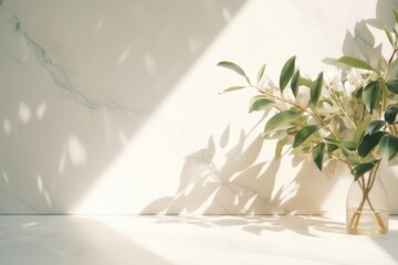 Wall Mural - minimalistic light background with blurred foliage shadow on a light wall.
