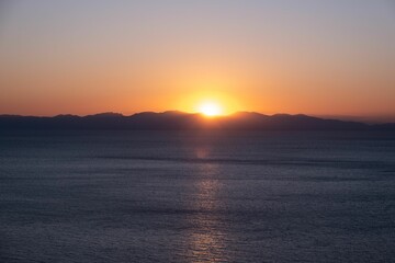 Poster - Stunning sunset view over a body of water