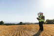 © Jordi Mora - Engineers taking photo on wind turbine field.