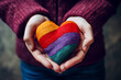 hands with heart, woman with the colorful ball, woman with rock in the colors of love