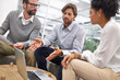 © Yuri A for PeopleImages/peopleimages.com - Creative, teamwork and meeting or discussion with laptop in office for project planning and strategy review. Collaboration, employees and diversity with talking, startup or technology and listening
