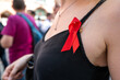 A girl with an AIDS ribbon