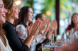 © Patcharaphon - Group of people clapping hands at meeting room for congratulate colleague on business achievements