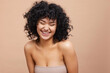 © Cultura Creative - Studio portrait of beautiful laughing woman