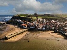 Whitby, North Yorkshire Showing Some Of The Town And Abbey.