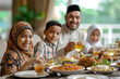 © talkative.studio - Photo of an Islamic family eating together
