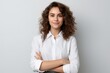 © pham - A woman wearing a white shirt strikes a pose as she gets ready to be photographed.
