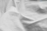 Fototapeta Desenie - White Linen Material Background. Light Fabric Textile Pattern. Empty Bed Surface.