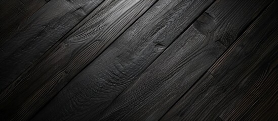 Canvas Print - Black clip pattern on dark wooden surface seen from above.