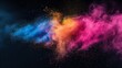 © Sunny - Colored scattering of multi-colored powder on a dark background. Holi celebration concept in India