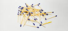 Safety Matches - Top View Of A Pile Of Scattered Safety Matches Isolated On A White Background