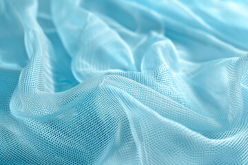 Closeup of abstract fishnet on light blue background.