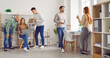 © Studio Romantic - Friendly atmosphere in team. Portrait of company staff working and talking in modern office during working day. Young Caucasian men and women in casual clothes working amicably in coworking space.