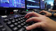 © Marco Attano - person's hands typing on an advanced, streamlined keyboard, with multiple monitors displaying productivity tools, symbolizing 'Working Smarter Not Harder'