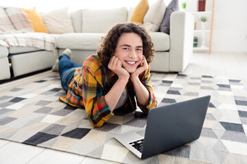 Poster - Photo of funny cheerful guy dressed checkered shirt online studying modern device indoors house home room