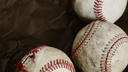 Wall Mural - Classic used baseball balls background with brown grunge texture, copy space for sport.