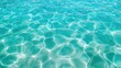 © Tati - Crystal clear aqua waters with sunlight dancing across the gentle waves, creating a mesmerizing pattern that evokes the tranquility and purity of a tropical paradise