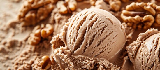 Wall Mural - A close-up of a scoop of chocolate ice cream adorned with walnuts - a delectable dessert made with natural ingredients.