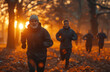© Gayan - Group of people jogging in a park at sunset, with autumn leaves on the ground.