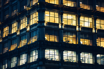 Wall Mural - window of the multi-storey building of glass and steel lighting and people within timelapse