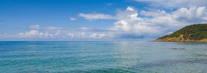 Wall Mural - Corsica, France, transparent turquoise water on a beautiful beach in summer
