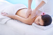 © Mariusz S/peopleimages.com - Sleep, spa and woman at pool for massage with health, wellness and luxury holistic treatment. Self care, peace and girl on table with professional masseuse for body therapy, relax and hotel service