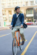 © Katie/peopleimages.com - Morning, commute and city road of businessman with bicycle for green and sustainable transportation. Cyclist, smile and bike for carbon footprint in New York by urban street with entrepreneur cycling