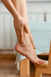© boomeart - Closeup view of hands massaging foot