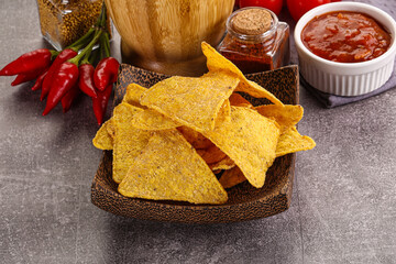 Wall Mural - Mexican corn nachos chips with salsa