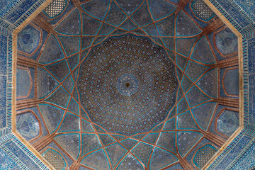 View of beautiful blue traditional floral and geometric design inside cupola at ancient Shah Jahan mosque in Thatta, Sindh, Pakistan	
