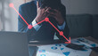 © sornthanashatr - bar, graph, investment, business, chart, crisis, down, financial, stock, decrease. market crash, stock trader broker businessman depressed watching stock market crash, business loss economic crisis.