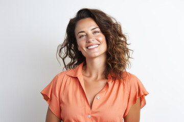 Wall Mural - Smiling woman in casual shirt posing on neutral background. Portrait and confidence.