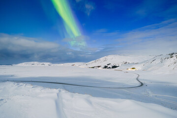 Canvas Print - Aurora borealis on the Lofoten islands, Norway. Northern Lights over the mountains. Scandinavia. Night sky with polar lights. Landscape in the north in winter time.