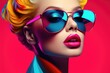 © Fotograf - A woman wearing sunglasses and a colorful scarf. Perfect for fashion and summer-themed projects