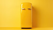 A yellow refrigerator placed against a yellow wall. Suitable for kitchen interior design concepts or home appliance advertisements
